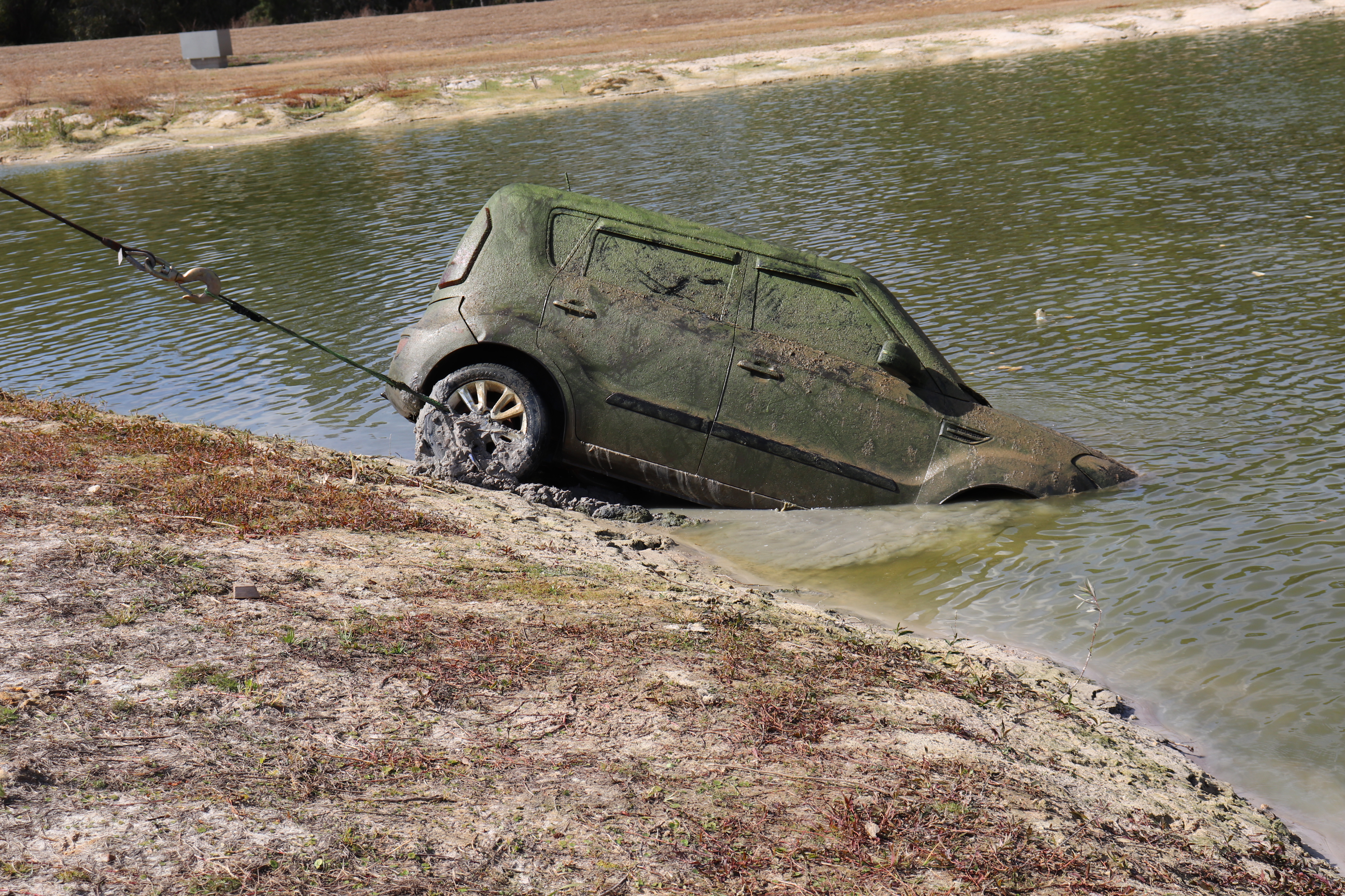Kia being removed from pond