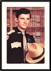 Johnny Smith posing in front of library